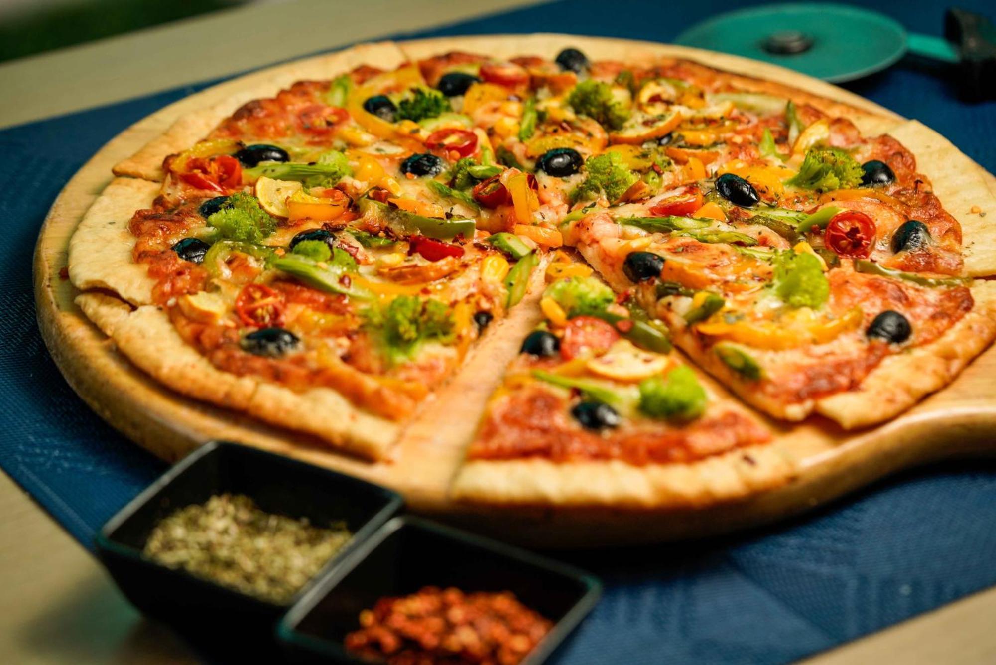 Novotel Kolkata Hotel And Residences Extérieur photo Pizza